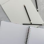 empty book page with pencil